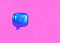 Metallic blue chat bubble with check mark inside over a pink background to show brand messaging.